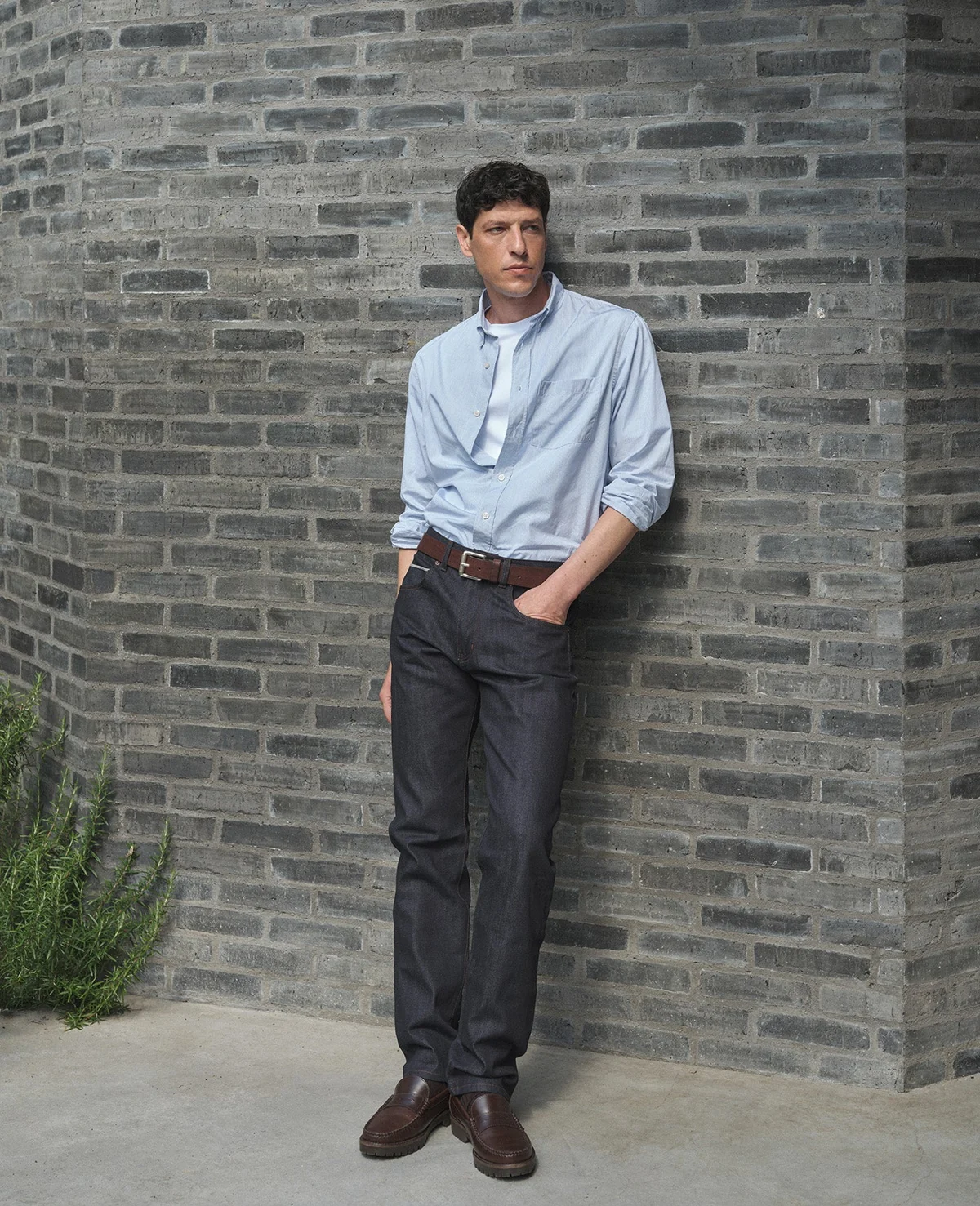 Pale blue shirt worn with dark trousers